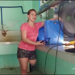Kiara refilling water